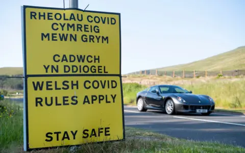 Getty Images Covid rules sign in Brecon Beacons