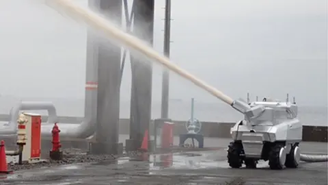 Mitsubishi Heavy Industries Robot water cannon truck firing jet of water