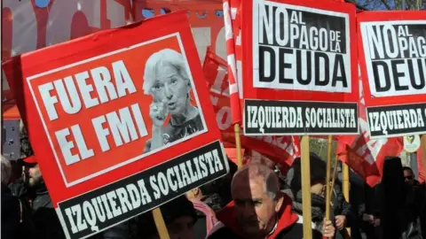 EPA People protest during a demonstration against the International Monetary Fund, in Buenos Aires, Argentina, 21 July 2018.