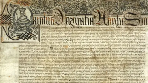 Huntingdonshire Archives  A town charter for Huntingdon issued by Charles I in 1631, with an ornate top inscription at the top