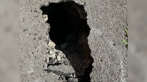 Birdseye shot of the sinkhole, it is one foot by two foot wide but is very deep