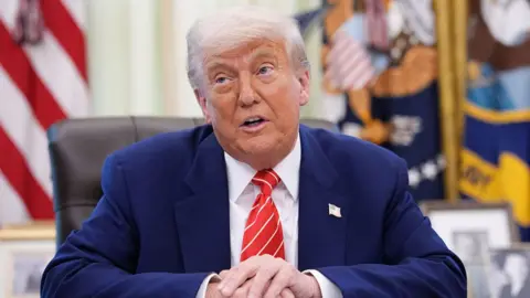 Donald Trump speaking in the Oval Office