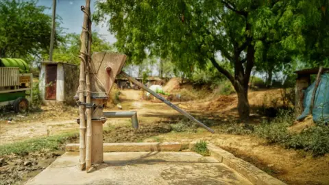 Seraj Ali A picture of the handpump Mamta goes to to collect water