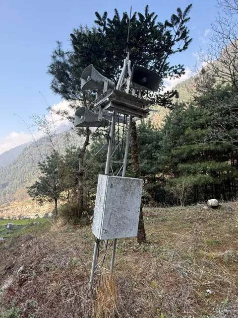Ang Nuru Sherpa A leaning early flood warning tower near the village of Ghat in the downstream of the Imja lake in the Everest region