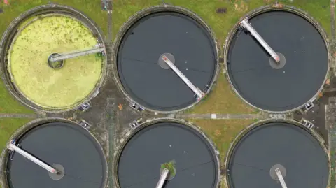 Reuters A drone view shows Mogden sewage treatment works, owned by Thames Water, in west London, Britain, July 9, 2024. 