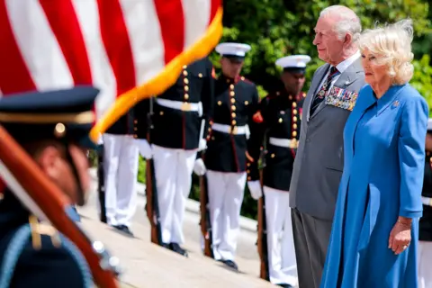 Getty Images King Charles III and Queen Camilla visit the Tomb of the Unknown Soldier during a ceremony at Arlington National Cemetery on the final day of the state visit of King Charles III and Queen Camilla on April 30, 2026 in Arlington, Virginia.