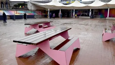 Exterior shot of Bradford Interchange's new proposed plaza, with pink benches 