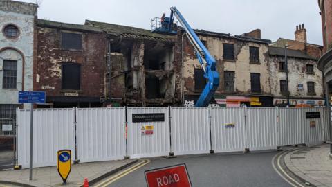 Contractors start work on stabilising the former shop on Kirkgate, in Leeds 