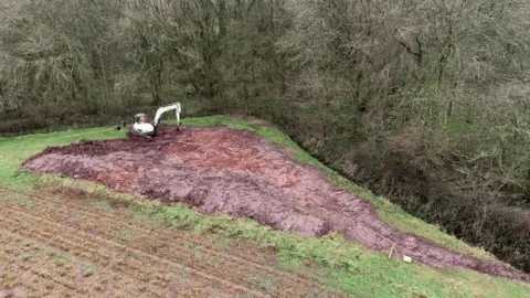 Trent Rivers Trust A digger on site at Crock Dumble, near Burton Joyce, preparing for groundwork.