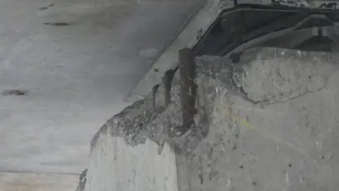 National Highways A picture showing a corroded support pillar