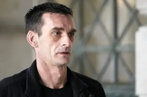 Getty Images Adrian Cook arriving at Amber's inquest