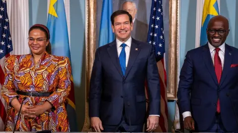 Two months ago, on 25 April, US Secretary of State Marco Rubio (C), Rwandan Foreign Minister Olivier Nduhungirehe (R) and Democratic Republic of the Congo Foreign Minister Therese Kayikwamba Wagner sign of a Declaration of Principles between the two countries in the Treaty Room of the State Department in Washington DC.