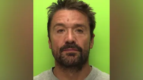 Custody image of Michael Cooper
