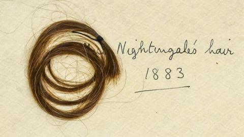 Lock of Florence Nightingale's hair with a note from 1883