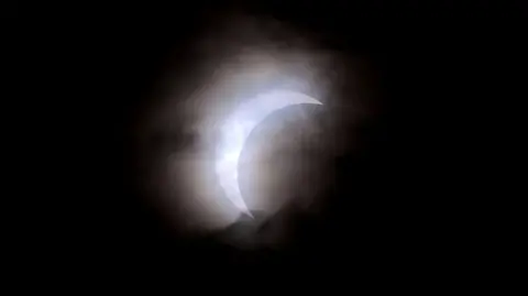 Pacemaker Partial solar eclipse in the sky