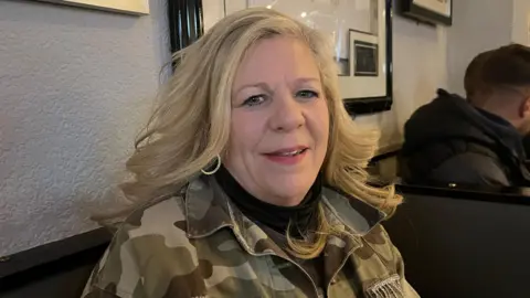 Clare Wragg sat inside the Neptune Pub in Derby