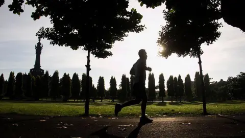 Man running on the street in Bali