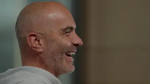Enzo Maresca laughs