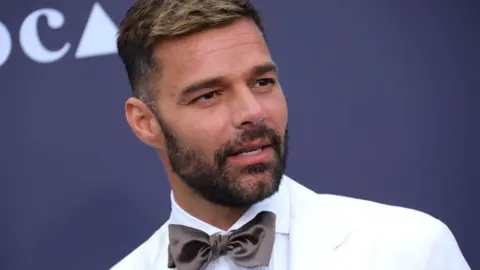 Getty Images Ricky Martin on a red carpet