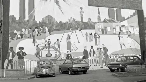 1970s photo showing mural in Evington Road