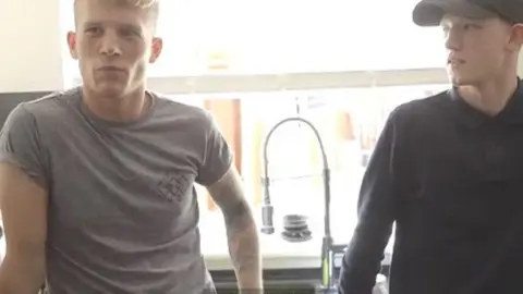 Connor (right) with his older brother Andrew