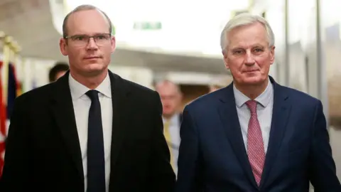 AFP/Getty Images Simon Coveney Michel Barnier