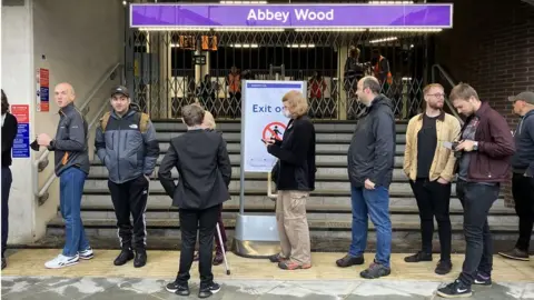 BBC Passengers queue at Abbey Wood