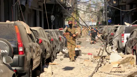 Reuters A soldier walks through the streets of Beirut