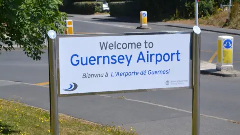 BBC Welcome to Guernsey Airport sign