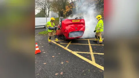 St Patrick's College School pupils are given a demonstration of a simulated crash
