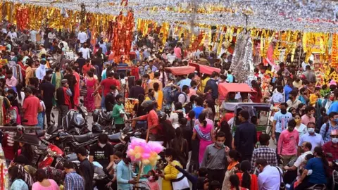 Getty Images Heavy crowds in Delhi markets ahead of the Diwali festival