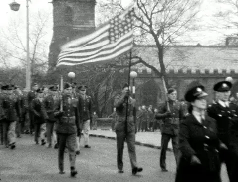 North West Film Archive Flag being used in parade in 1942