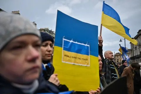 Jeff J Mitchell/Getty Images Demonstration outside Russian Consulate