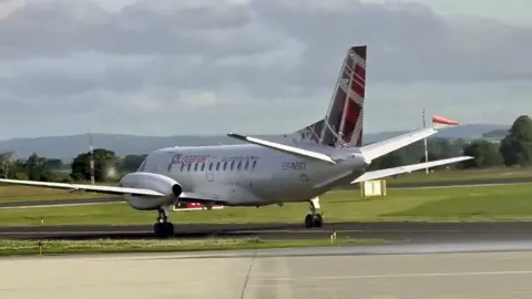 BBC Loganair plane at Carlisle Airport