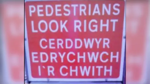 Eirwen Rowlands Sign in English and Welsh