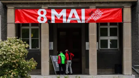Getty Images A sign reading 8 May hangs on the German-Russian Museum in Berlin