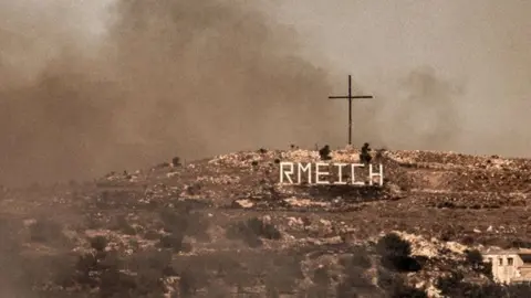 Smoke rises following Israeli bombardment of hills near Rmeish, in southern Lebanon (22 October 2024)