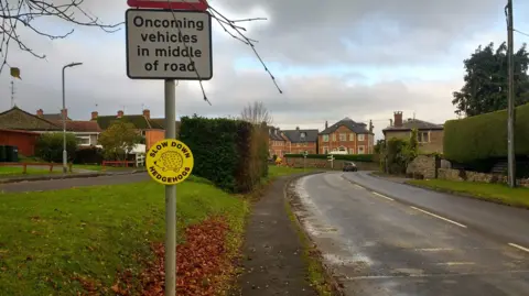 Carie Schuster A hedgehog sign in Templecombe