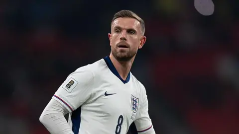 Jordan Henderson in action for England