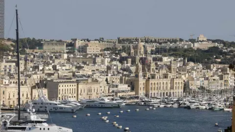 The harbour of Valletta with the city in the background 