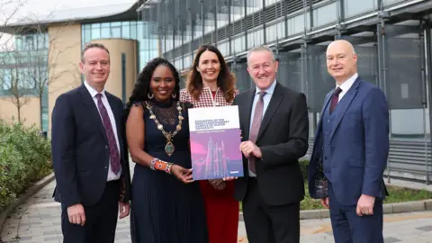 DCSDC At Ulster University's Derry~Londonderry campus at the launch of the Magee Expansion Taskforce's final report and Action Plan are (l-r) Stephen Kelly, Chair of the Magee Taskforce; Cllr Lilian Seenoi Barr, Mayor of Derry City and Strabane District Council; Nicola Skelly, Vice Chair of the Magee Taskforce; Economy Minister Conor Murphy; and Professor Paul Bartholomew, Vice-Chancellor of Ulster University.