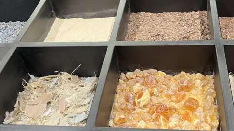 Christine Ro Trays containing linoleum ingredients.