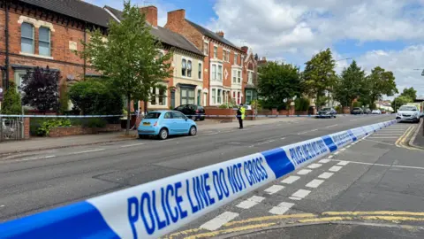 A police cordon in Aylestone Road in Leicester 