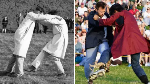 PA A composite image showing two pictures side by side. On the left is a black and white archive picture of two men engaged in a shin kicking competition in 1951. They are wearing long white tunics and trousers, and are holding each others' shoulders as one kicks the other's shin. On the right there is a modern coloured image of the same event in 2026.
