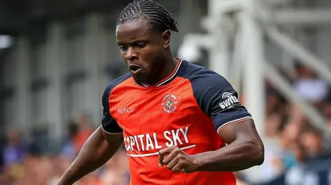 Luton Town Forward Millenic Alli (7) during the EFL Sky Bet League 1 match between Luton Town and Cardiff City at Kenilworth Road