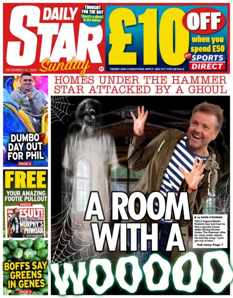 The front page of the Daily Star, headlined with "A Room with a Wooo", reflecting a story about a haunted house on the set of BBC One's Homes Under the Hammer. 