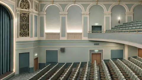 Josephine Barkshire Artist's impression showing inside the future theatre, with blue seats and carpet and gold details throughout.
