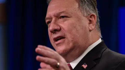 Getty Images US Secretary of State Mike Pompeo at a press conference at the State Department in Washington, 21 October 2020