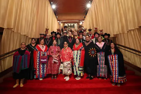 Reuters Members of the Osage Nation pose on the red carpet during the Oscars arrivals at the 96th Academy Awards in Hollywood, Los Angeles, California, U.S., March 10, 2024