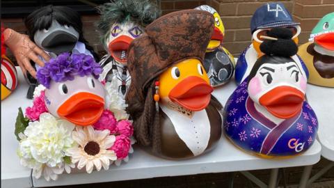 Decorated ducks on a table